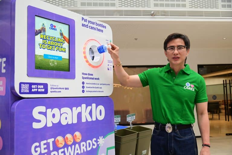 SM Supermalls President Steven Tan Tests Sparklo Reverse Vending Machine